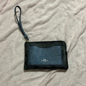 Blue coach wristlet (small)